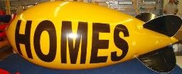 14 ft. advertising blimp with HOMES lettering